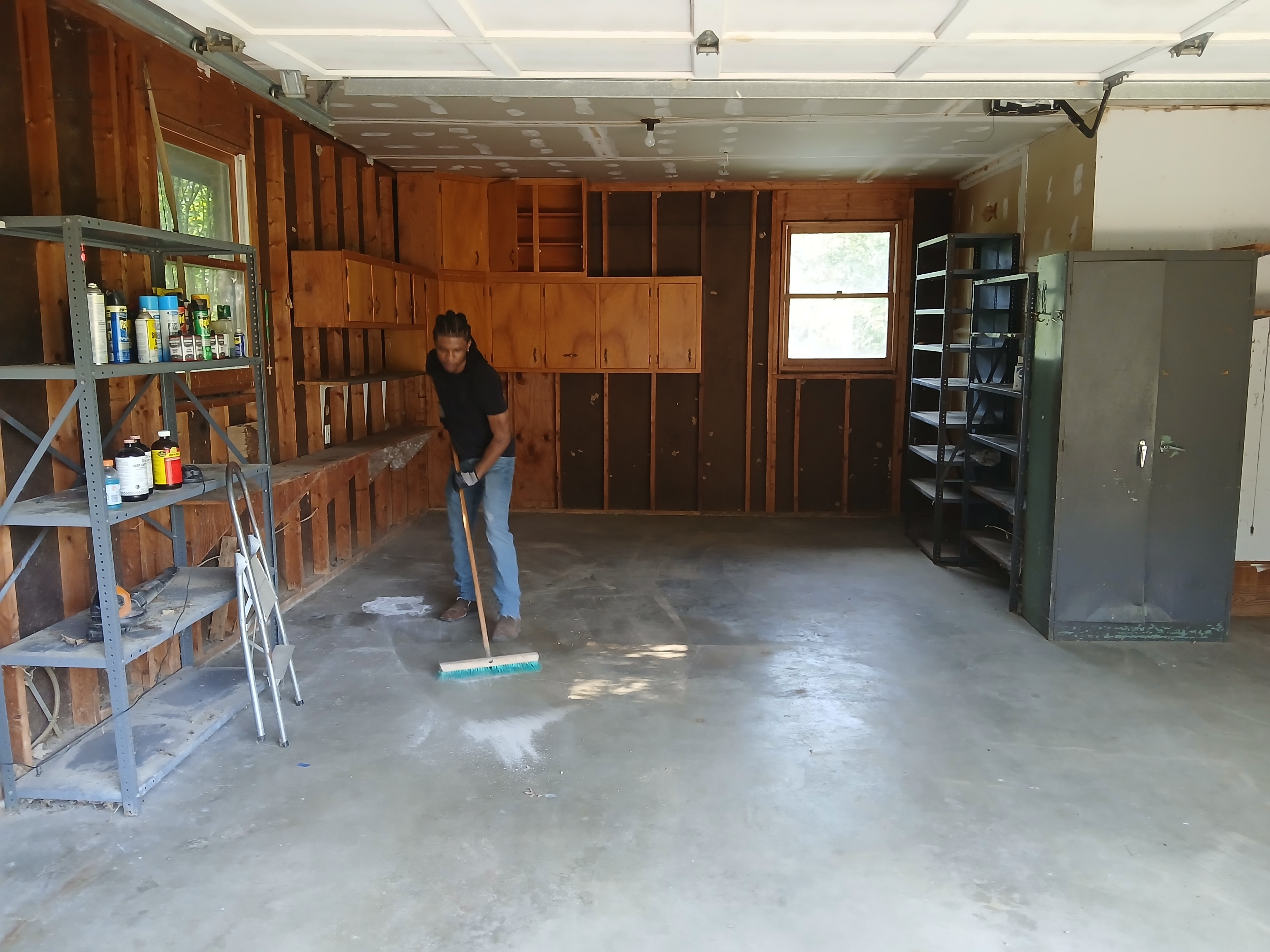 Garage swept clean after full cleanout — Ronalds Junk Removal